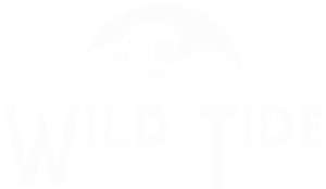 Wild Tide logo in white with a translucent background.